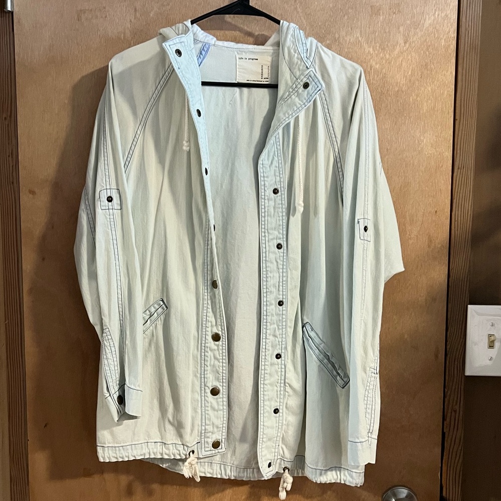 Hooded light wash denim trench jacket